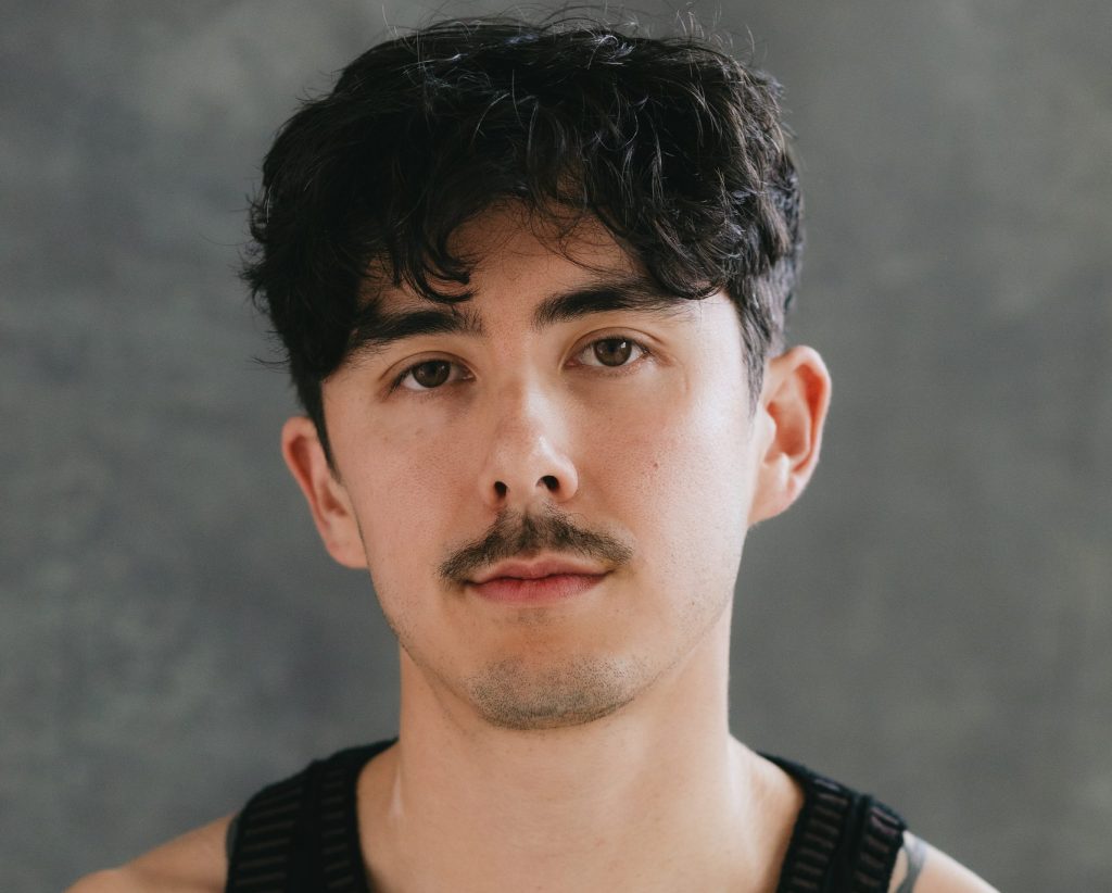 Portrait of man in black tank top